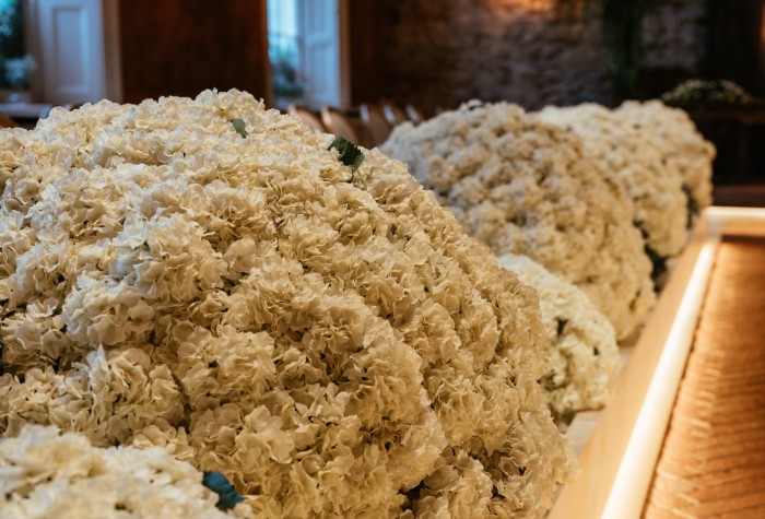 Faux hydrangeas featured in the aisle walkway at the Croft Hotel
